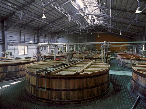 Wooden washbacks for fermenting the wort for two days to produce a low strength alcoholic wash used in the final distillation  Suntory Hakushu Distillery Yamanashi Prefecture Japan