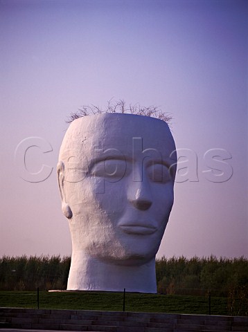 Giant rotating head sculpture at Floriade flower festival Netherlands