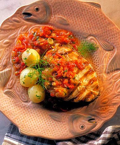 Grilled fish with boiled potatoes and chilli tomato