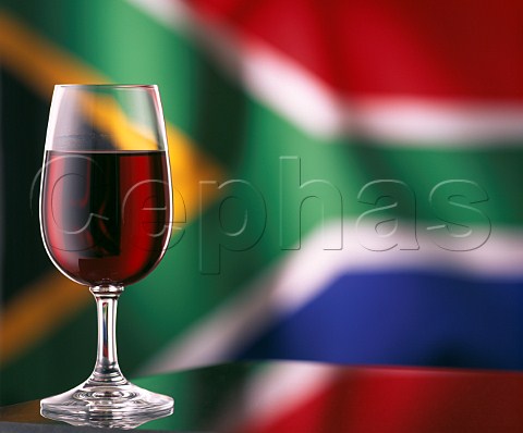 Glass of red wine and South Africa flag