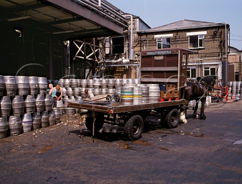 Brewers dray being unloaded and barrels decorked at Youngs Ram Brewery Wandsworth London