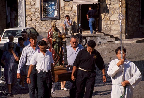 Statue of St Peter carried in procession   during Fiesta de San Pedro Comillas Cantabria Spain