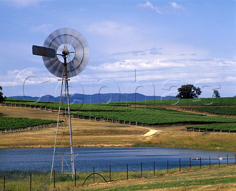 Water pump and dam amidst the vineyards of   Montrose Wines Mudgee New South Wales Australia    Mudgee