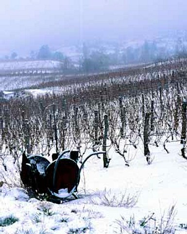 Mobile incinerator in snow covered vineyard near   Apremont Savoie France AC Apremont