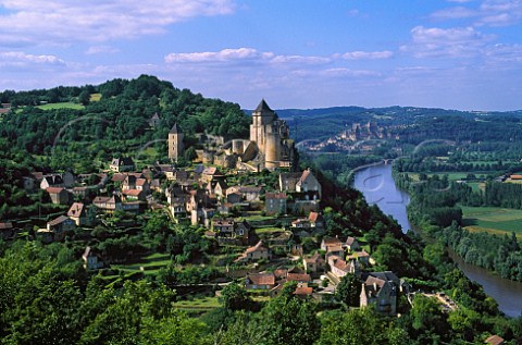 Castelnaud chteau and village above the   Dordogne River with Beynac in the   distance   Dordogne France