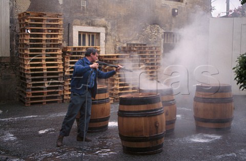 Steam cleaning of barrels at Domaine de   la RomaneConti VosneRomane Cte dOr France