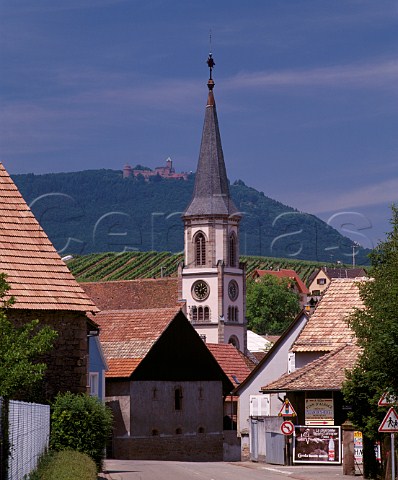 The church in Rorschwihr with Chteau de  HautKoenigsbourg on the hill beyond  HautRhin France  Alsace