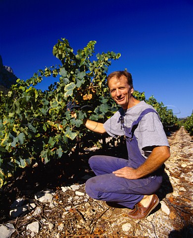 Jean Orliac of Domaine de lHortus in one of his   Syrah vineyards on the slopes of   Pic StLoup near StMathieudeTrviers Hrault   France    Coteaux du Languedoc Pic StLoup