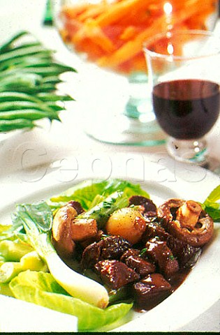 Boeuf Bourguignon with a glass of   red wine