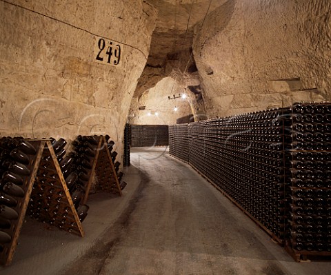 Wines en pupitres and sur lattes in the cellars   of Veuve Clicquot Ponsardin in the GalloRoman chalk   quarries crayres of Reims Marne France    Champagne
