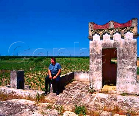 Francesco Taurino on the roof of the old house in   the Chardonnay vineyard of Cosimo Taurino near   Guagnano Puglia Italy