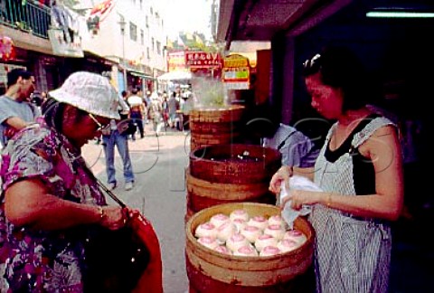 Selling steamed buns at the annual Bun   Festival Hong Kong