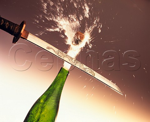 Opening bottle of champagne with a sabre