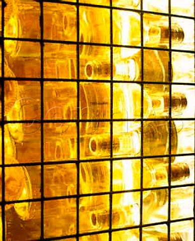 Newlybottled white wine awaits labelling at   Denbies Wine Estate Dorking Surrey