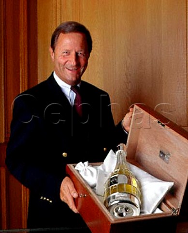 JeanFranois Barot now retired with a magnum of LExclusive in its presentation case Champagne Ruinart ReimsMarne France 