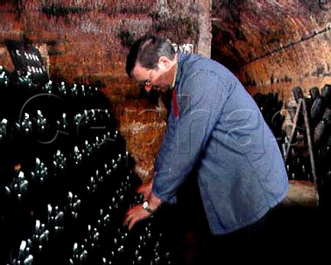 Remueur at work in the cellars of Champagne   LaurentPerrier TourssurMarne Marne France