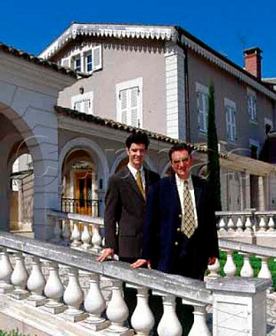 Marcel Guigal and his son Philippe in the gardens of   their house at Ampuis Rhne France