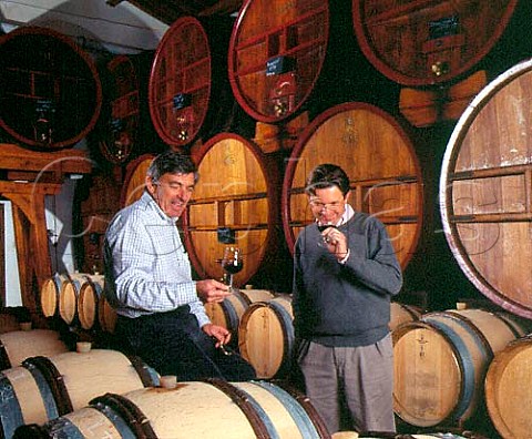 JeanPierre left and Franois Perrin in the barrel   cellar of Chteau de Beaucastel  Courthzon Vaucluse France  ChteauneufduPape