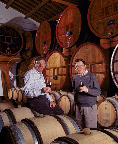 JeanPierre left and Franois Perrin in the barrel  cellar of Chteau de Beaucastel Courthzon Vaucluse France ChteauneufduPape