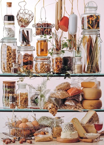 Larder and contents Dried tofu pulsesbeans nuts pasta vegetarian sausages eggscheese rice herbs bulgar wheat pine kernels vegetable stock cubes seaweed carob cinnamonsticks liquorice bark dried fungi and a glass of wine