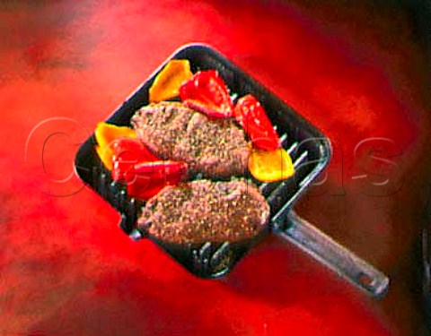 Steak au poivre with grilled bell peppers