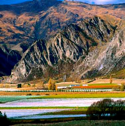 View over Gibbston Valley to Nevis Bluff with Two Paddocks Vineyard in foreground Gibbston New Zealand Central Otago