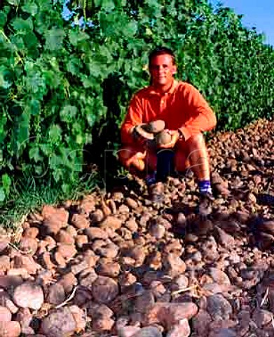 Christophe Baron of Cayuse Vineyards with the basaltcobbles which cover the ground in his SyrahplantedCailloux vineyard  these are due to it beingplanted in the ancient bed of the Walla Walla RiverMiltonFreewater Oregon USA Walla Walla Valley AVA