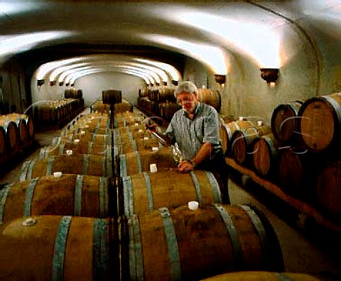 David Adelsheim sampling from barrel in the cellars   of Adelsheim Vineyard Newberg Oregon USA      Willamette Valley AVA