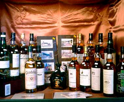 Display of local whiskies in The Whisky Shop   Dufftown Banffshire Scotland   Speyside