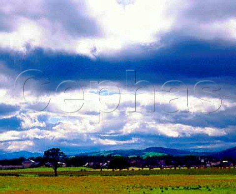 The town of Alness  home of Teaninich and Dalmore   whisky distilleries  with Cnoc Ceislein behind  Rossshire Scotland    Highland