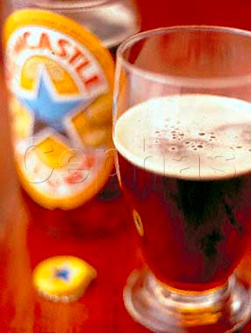 Bottle and glass of Newcastle Brown Ale