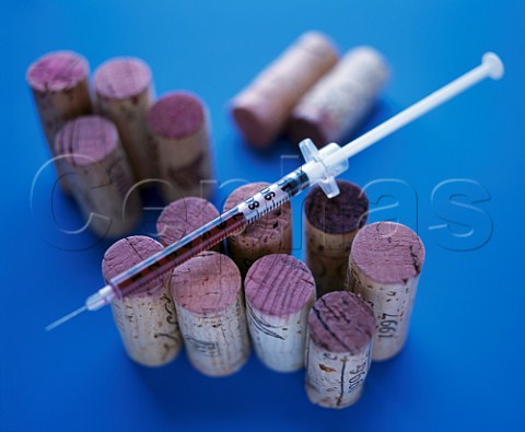 Wine corks with hypodermic syringe