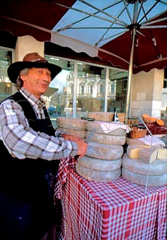 Cheese seller from Savoie in the market   at Beaune Cte dOr France