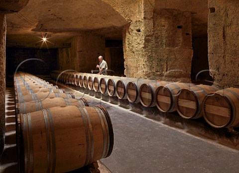Alain Vauthier in the barrel cellar of   Chteau Ausone Stmilion Gironde France        Stmilion  Bordeaux