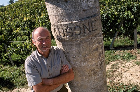Alain Vauthier by stone pillar in  vineyard of Chteau Ausone Stmilion  Gironde France  Stmilion  Bordeaux