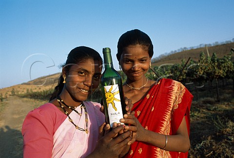 Sula Vineyards workers with bottle of   Sauvignon Blanc   Nasik Maharashtra province India