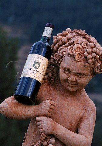 Statue of Bacchus with bottle of   Chteau de Pibarnon red wine   La CadiredAzur Var France  Bandol