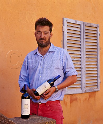 Sebastiano Rosa with bottles of Guidalberto 2001 at Tenuta San Guido Bolgheri Tuscany Italy     Bolgheri
