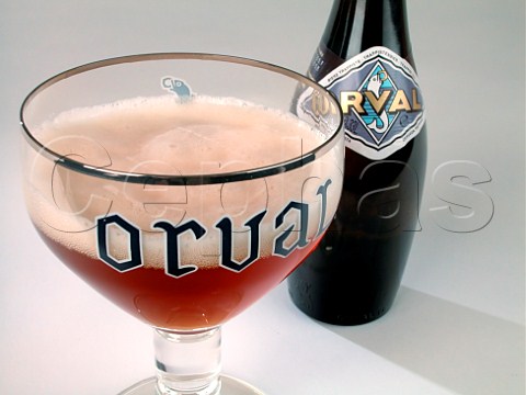 Bottle and glass of Orval trappist beer Belgium
