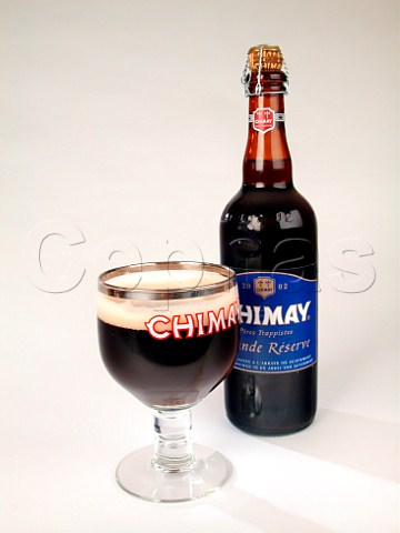 Bottle and glass of Chimay Trappist beer brewed at   Abbaye de NotreDame de Scourmont Forges Belgium   Capsule Bleue 71