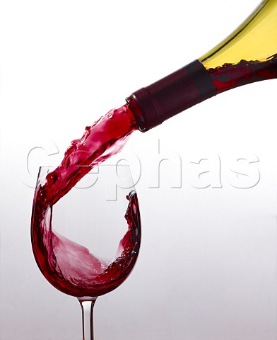 Pouring glass of red wine