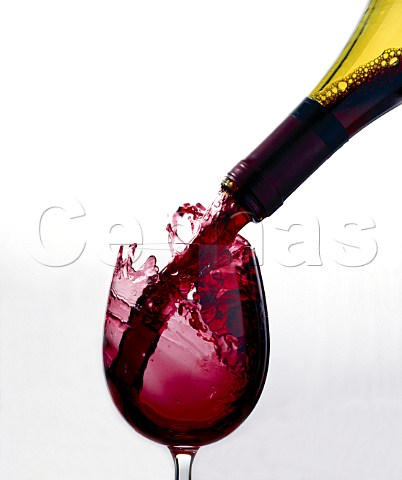 Pouring glass of red wine
