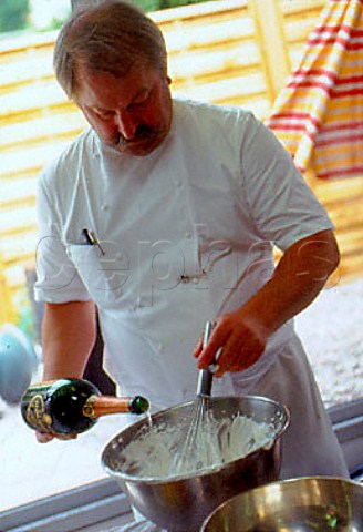 Chef blending Champagne and cream   Reims France