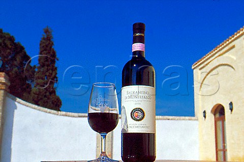 Bottle and glass of Sagrantino at the   Scacciadiavoli winery   Montefalco Umbria Italy