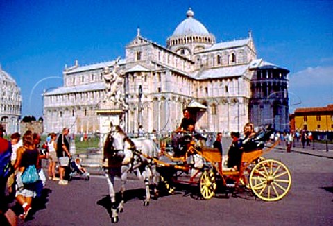 Tourist horse and carriage by the   cathedral in the Piazza dei Miracoli   Pisa Tuscany Italy