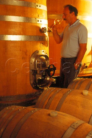 Enrico Tomalino winemaker in the   barrel cellar of La Giustiniana Gavi   Piemonte Italy