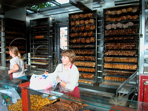 Grilled chicken stall in Brugge Saturday market   Belgium