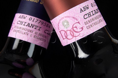 Necks of bottles of Il Molino di Grace Chianti   Classico showing the DOCG labels