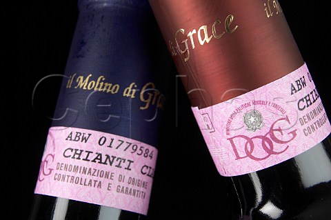 Necks of bottles of Il Molino di Grace Chianti   Classico showing the DOCG labels