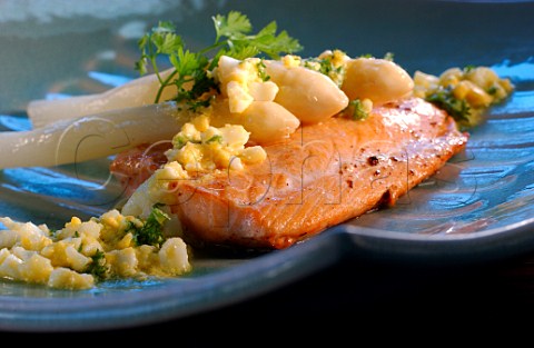 Poached salmon with asparagus and scrambled egg